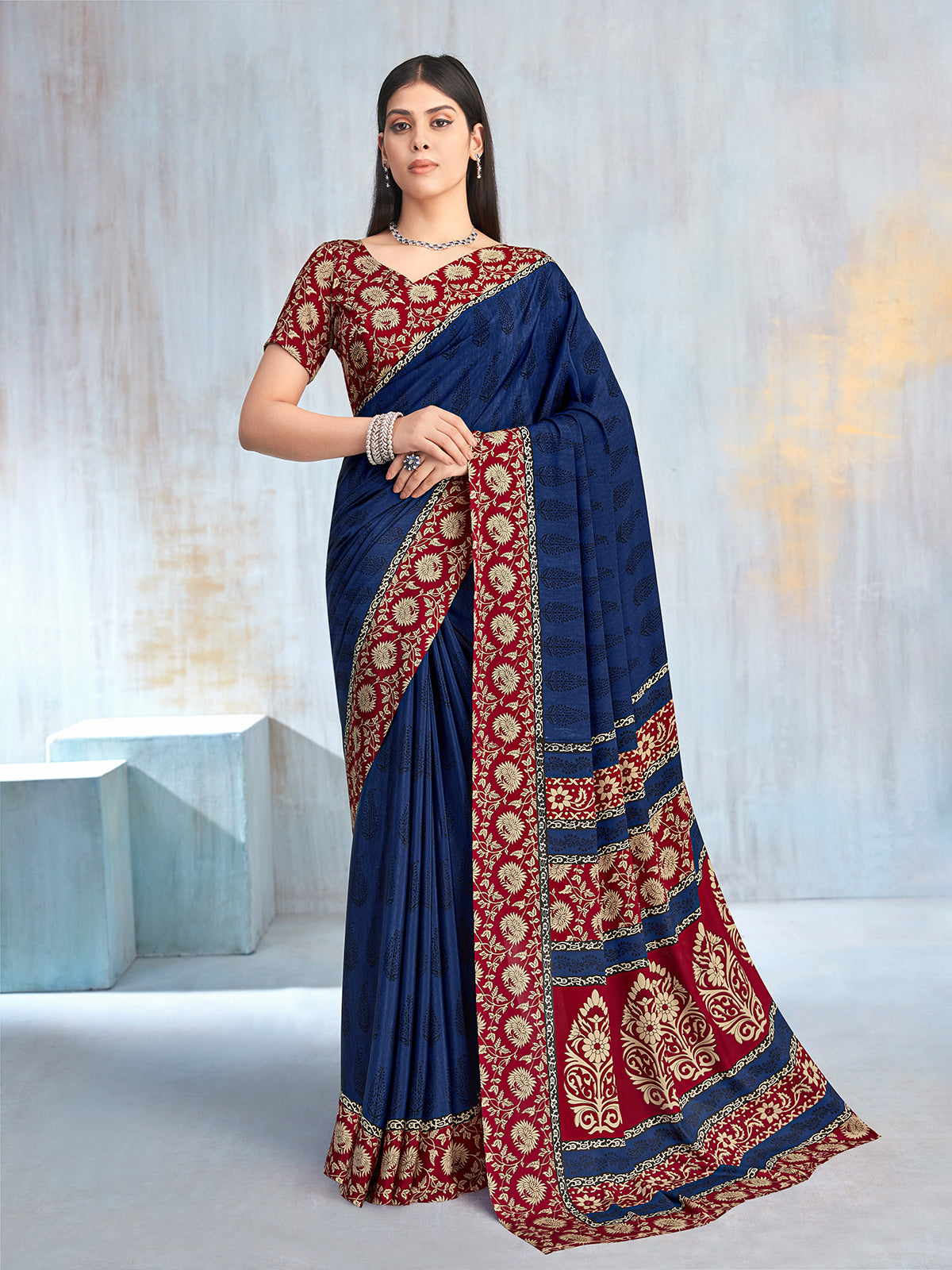Blue floral printed contrast border and pallu crepe saree