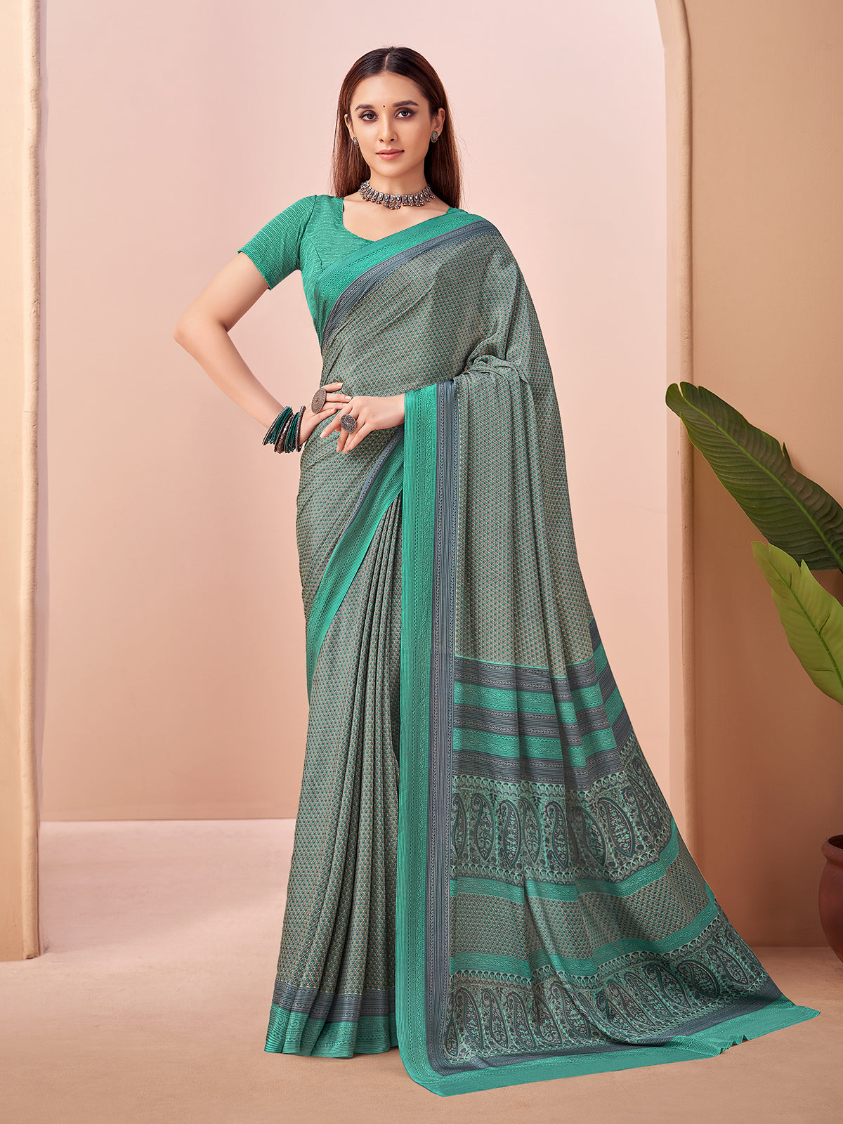 Mint blue printed crepe silk saree with unstitched blouse