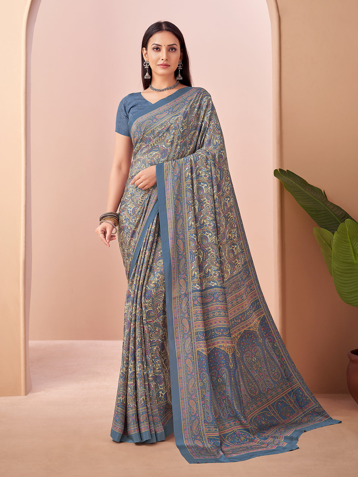 Stone blue printed crepe silk saree with unstitched blouse