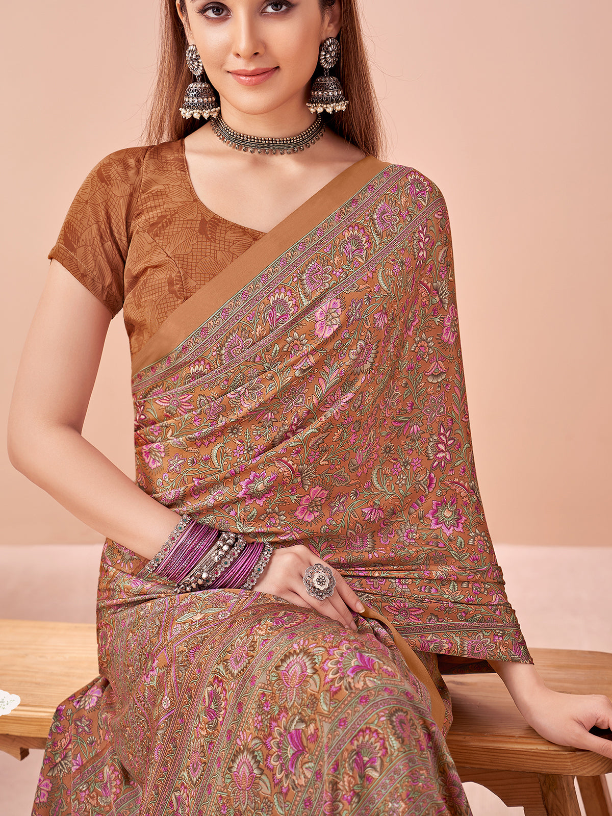 Brown printed casual crepe silk saree with unstitched blouse