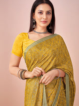 Mustard yellow printed casual crepe silk saree with unstitched blouse