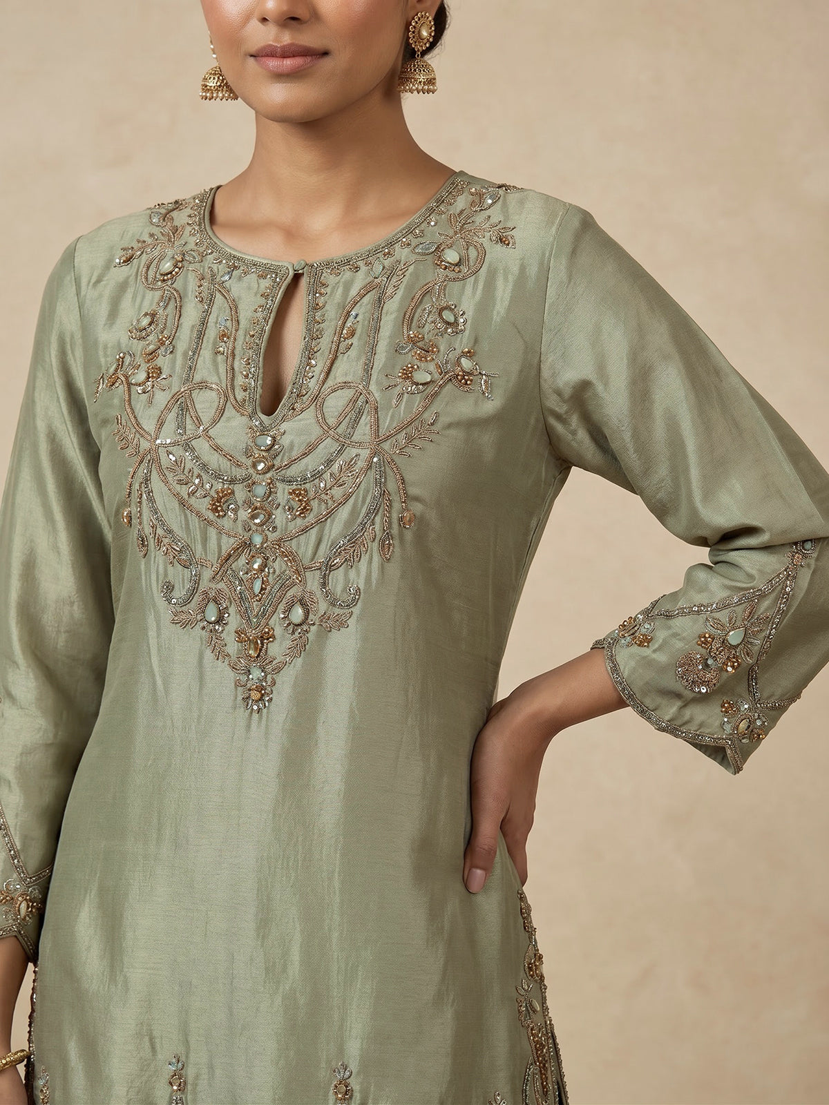 Pastel green women gold floral sharara suit