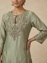 Pastel green women gold floral sharara suit