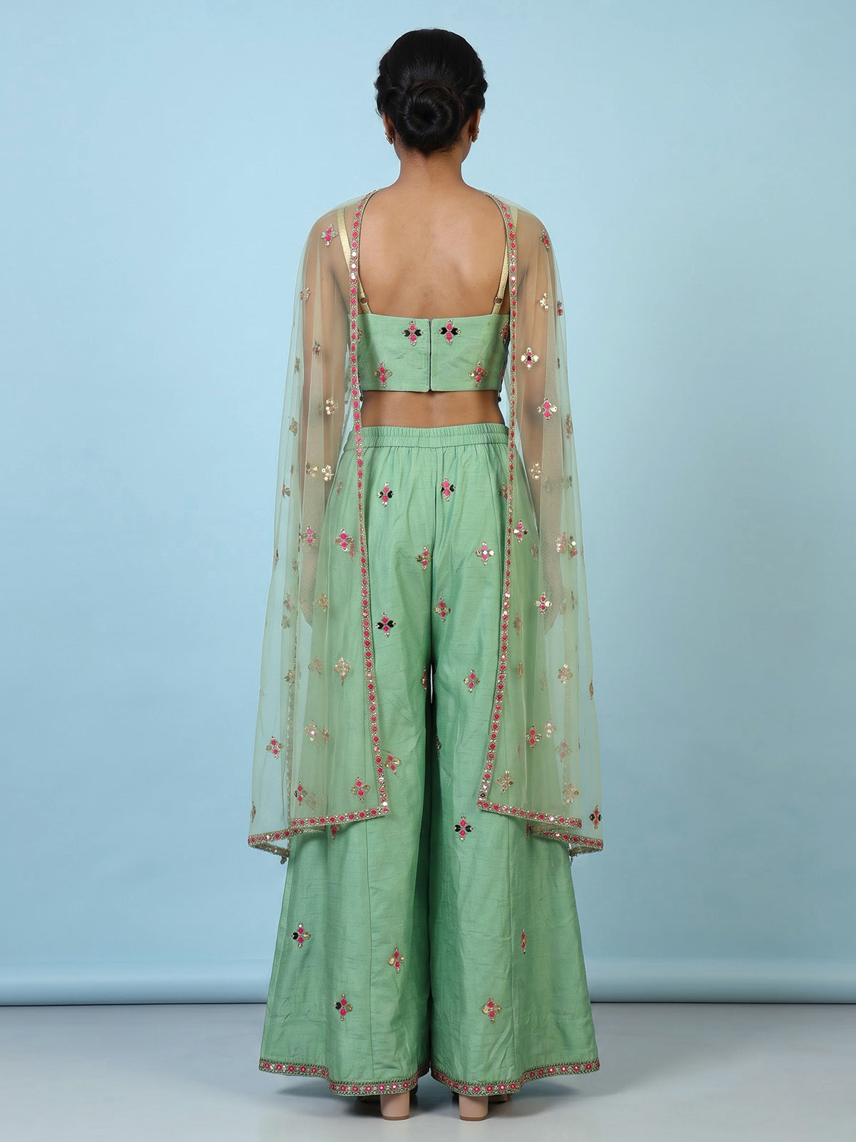 Pista green women jharokha embellished sharara suit