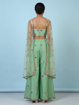 Pista green women jharokha embellished sharara suit