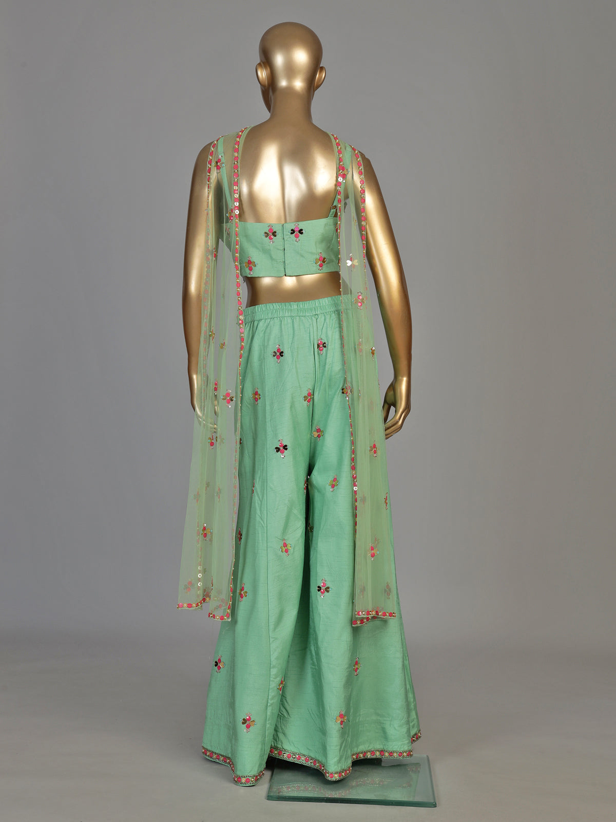 Pista green women jharokha embellished sharara suit