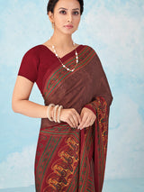 Maroon printed crepe silk saree with unstitched blouse
