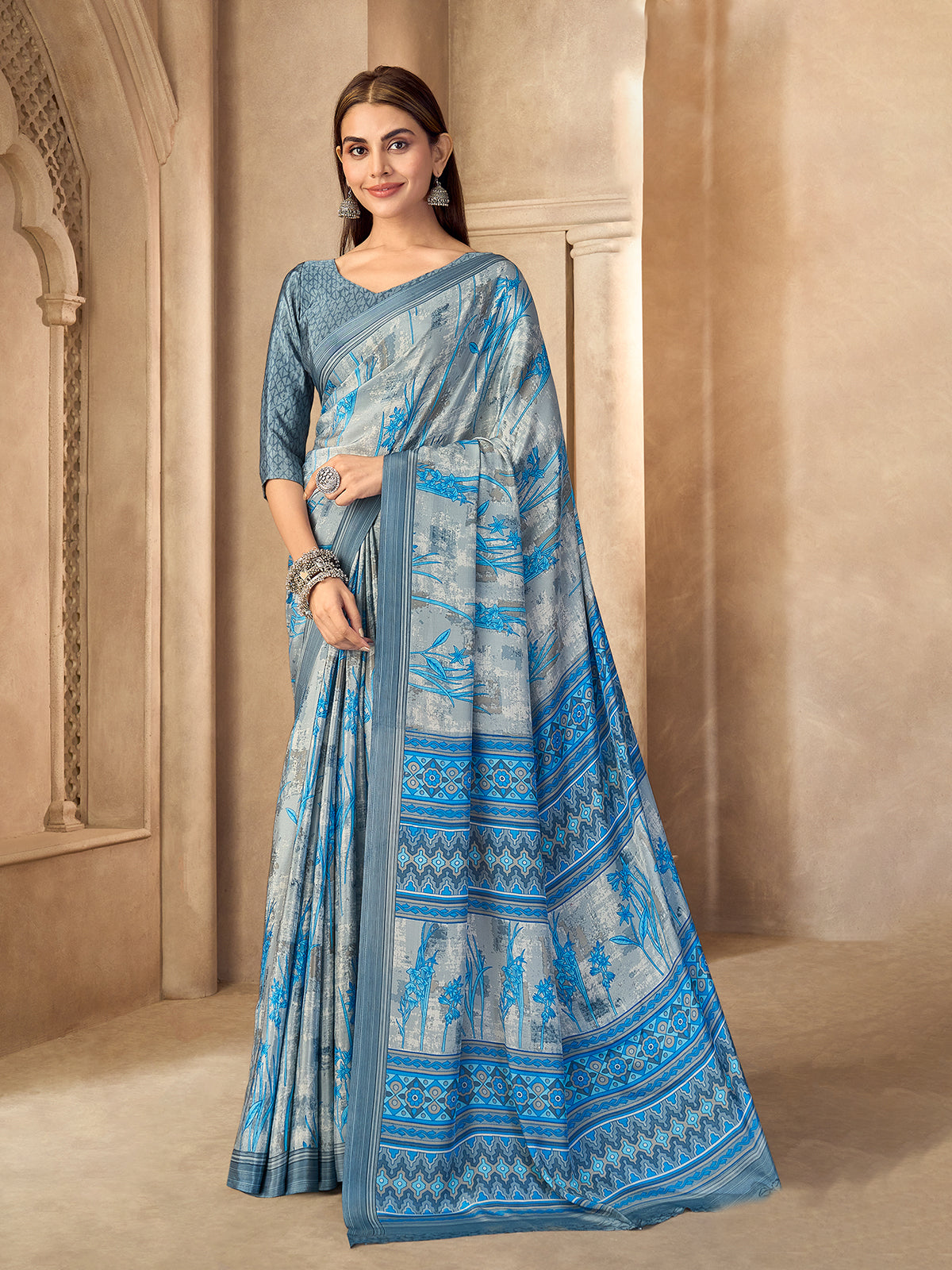 Light silver printed crepe silk saree with unstitched blouse