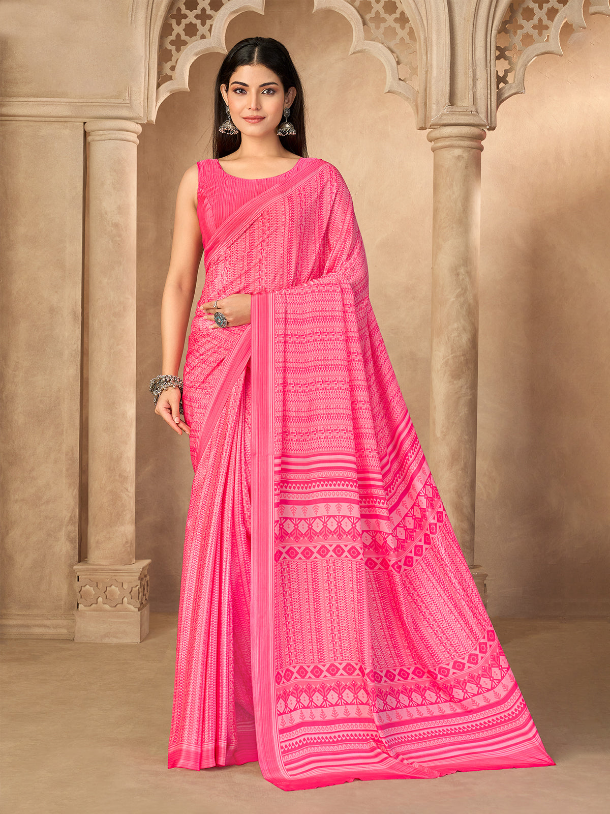Pink geometric printed crepe silk saree with unstitched blouse