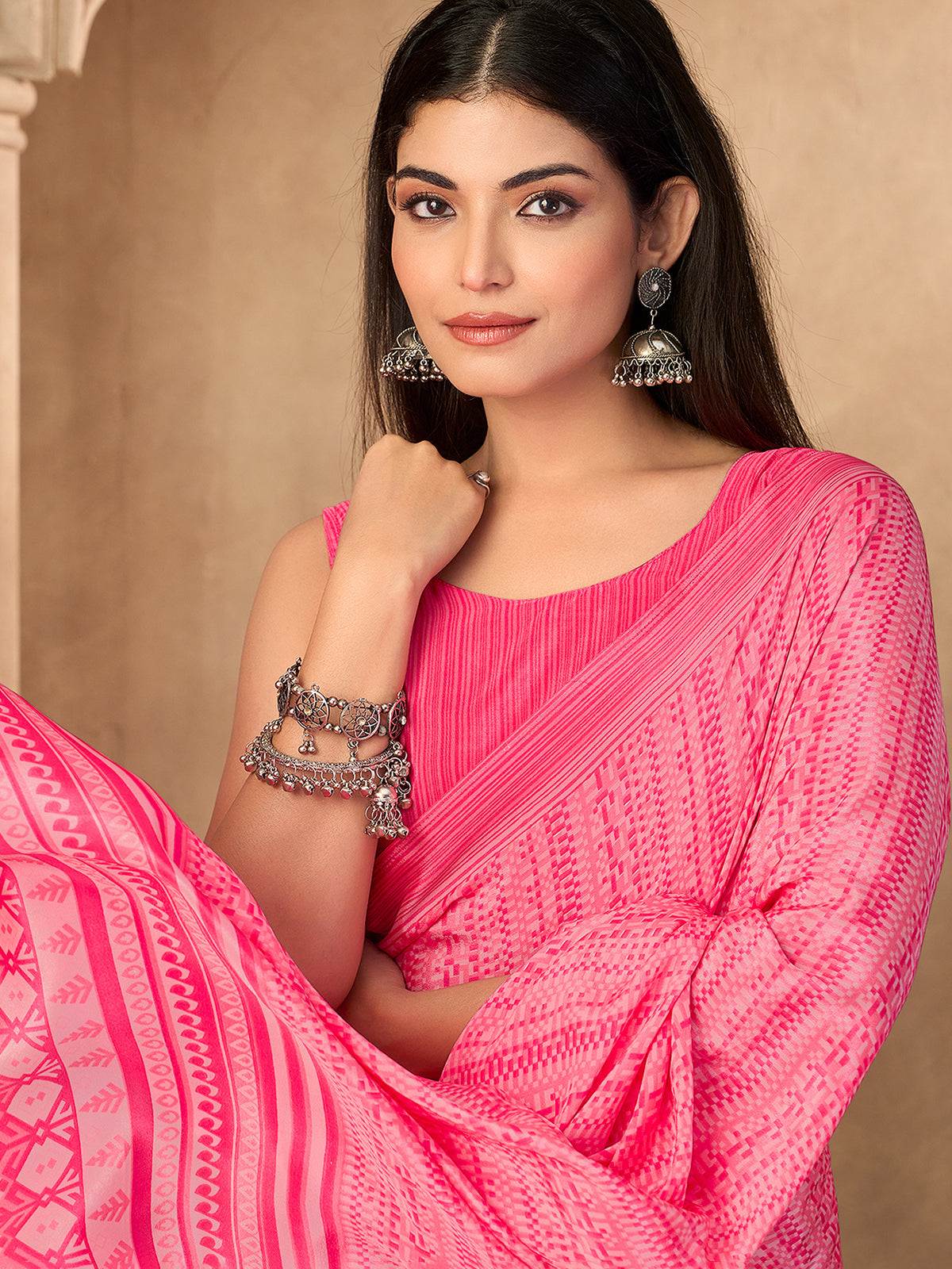 Pink geometric printed crepe silk saree with unstitched blouse
