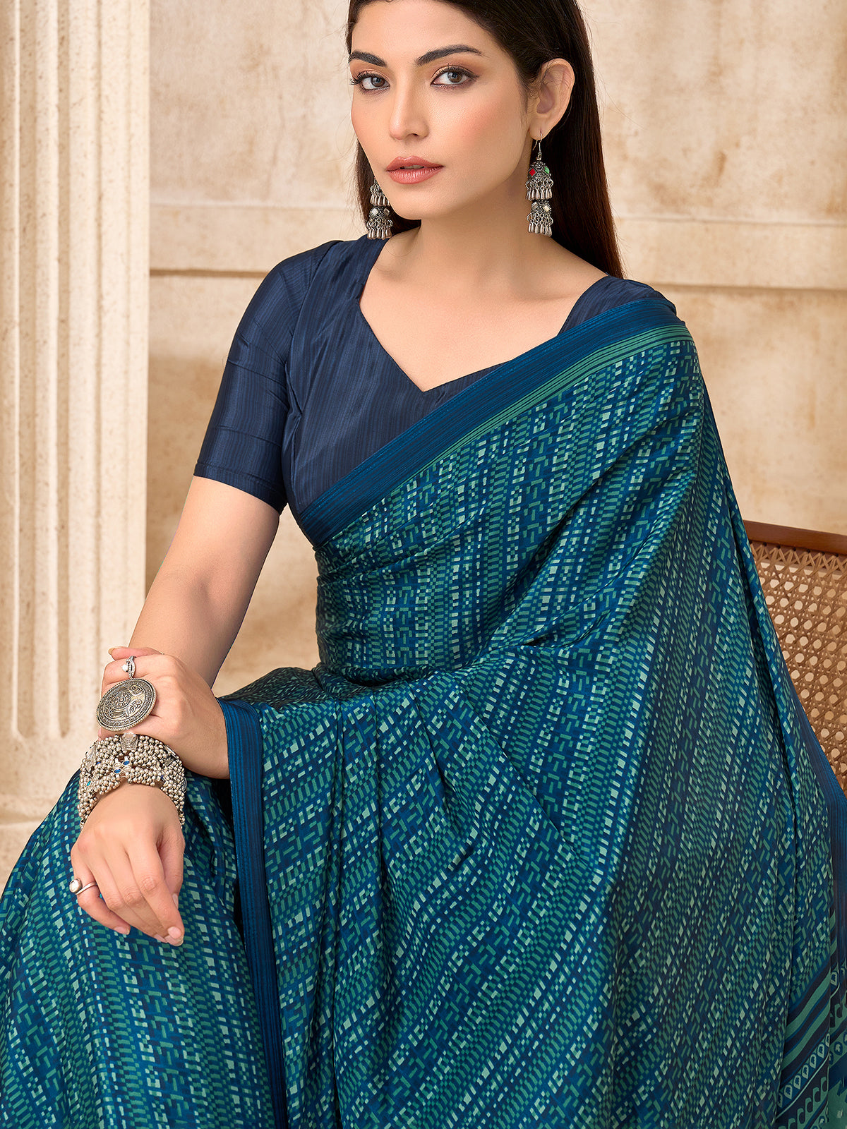 Peacock blue geometric printed crepe silk saree