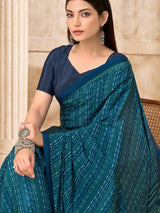 Peacock blue geometric printed crepe silk saree