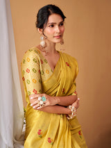 Light yellow graceful tissue silk saree