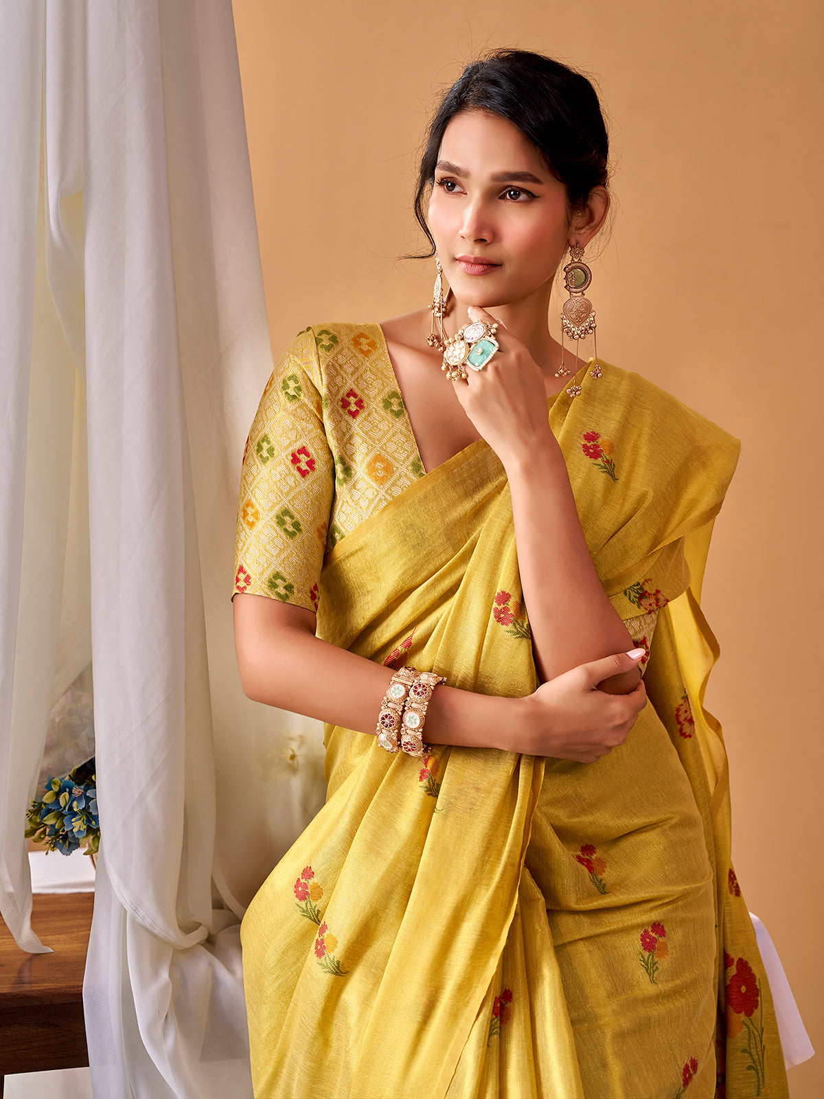 Light yellow graceful tissue silk saree