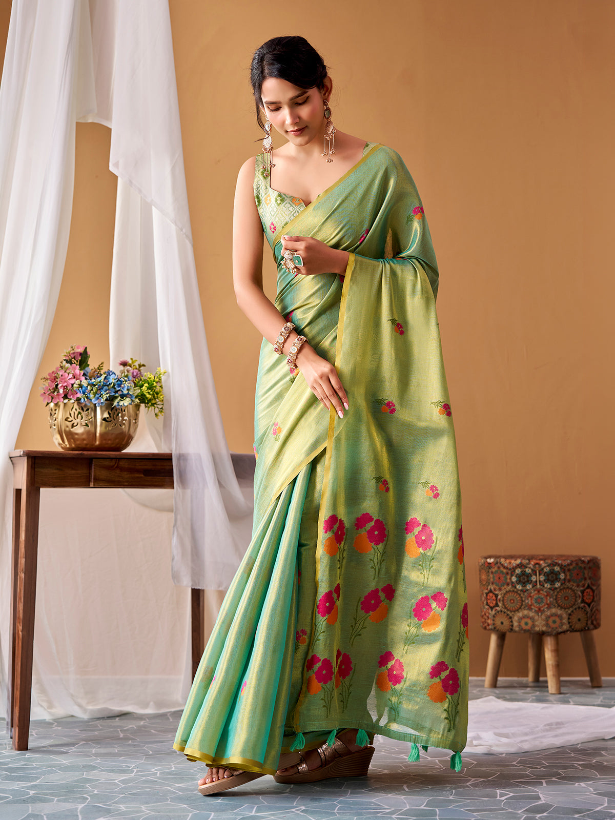 Green premium woven tissue silk saree