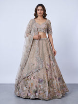 Beige tissue silk lehenga choli with luxurious designer embellishments