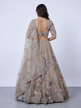 Beige tissue silk lehenga choli with luxurious designer embellishments