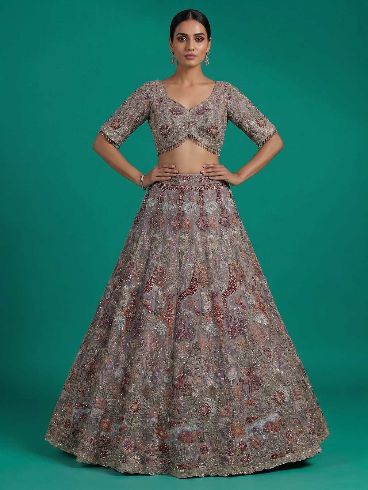 Grey silk lehenga choli with ornate floral and animal motifs