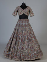 Grey silk lehenga choli with ornate floral and animal motifs