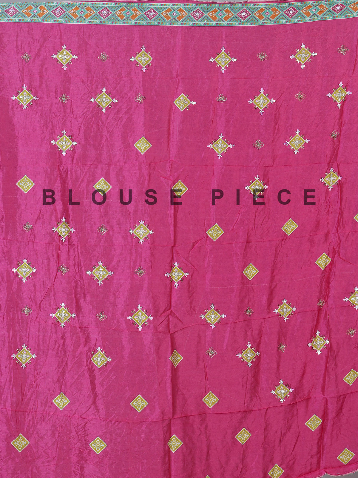 Rani pink silk unstitched lehenga choli with sparkling traditional detailing