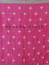 Rani pink silk unstitched lehenga choli with sparkling traditional detailing