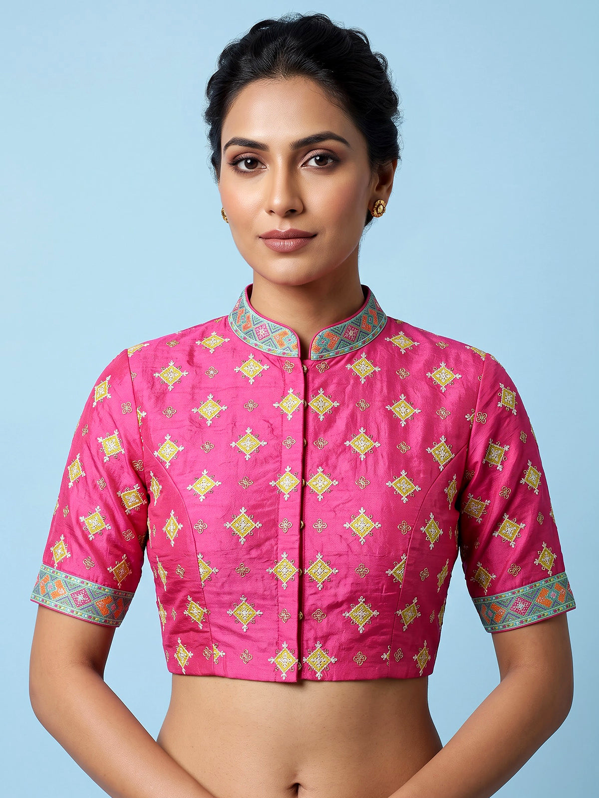Rani pink silk unstitched lehenga choli with sparkling traditional detailing