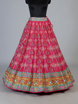 Rani pink silk unstitched lehenga choli with sparkling traditional detailing