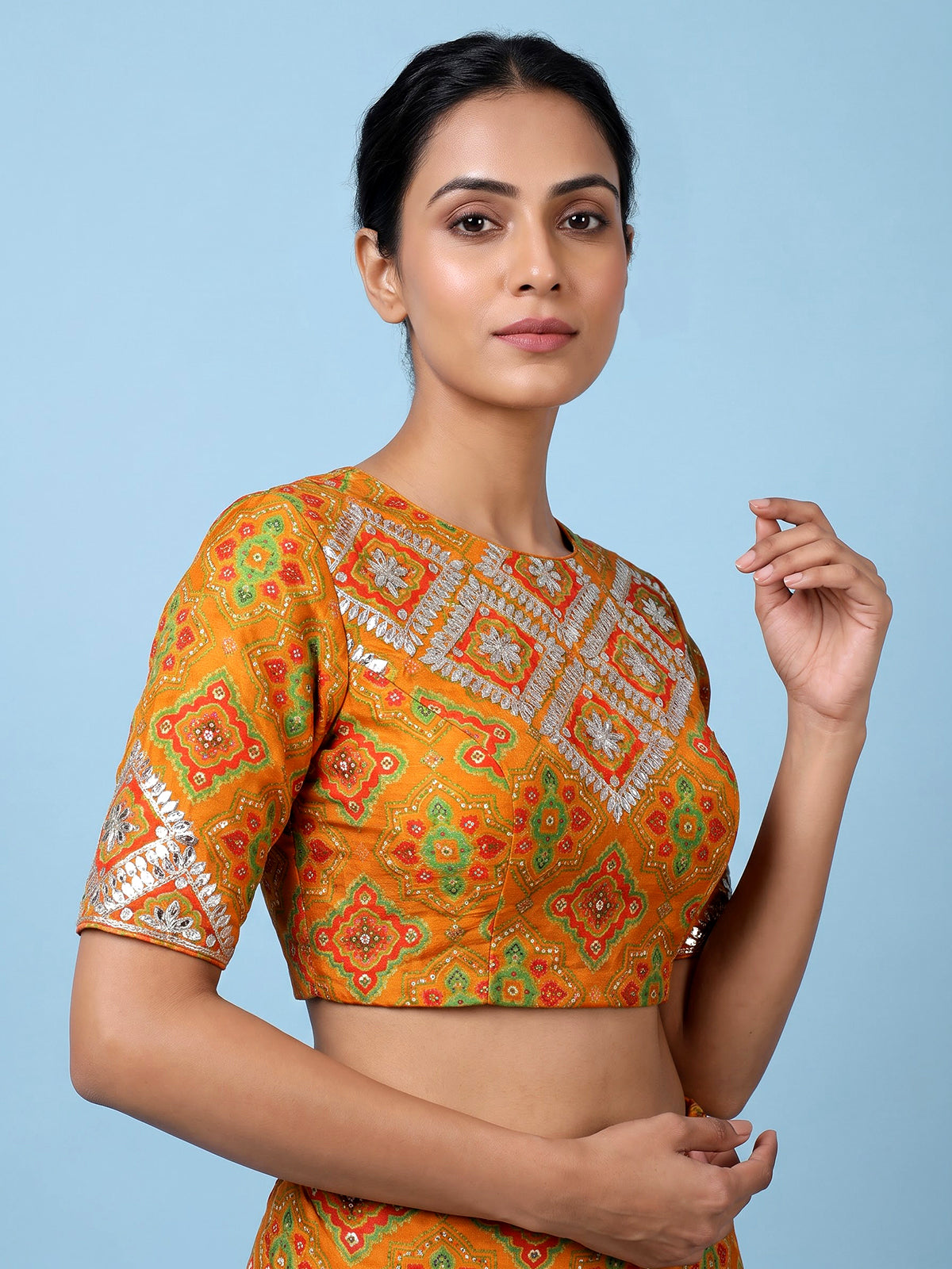 Orange silk unstitched lehenga choli with bandhani elegance