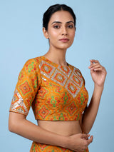Orange silk unstitched lehenga choli with bandhani elegance