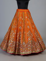 Orange silk unstitched lehenga choli with bandhani elegance