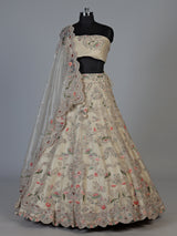 Beige tissue silk unstitched lehenga choli with pearl elegance