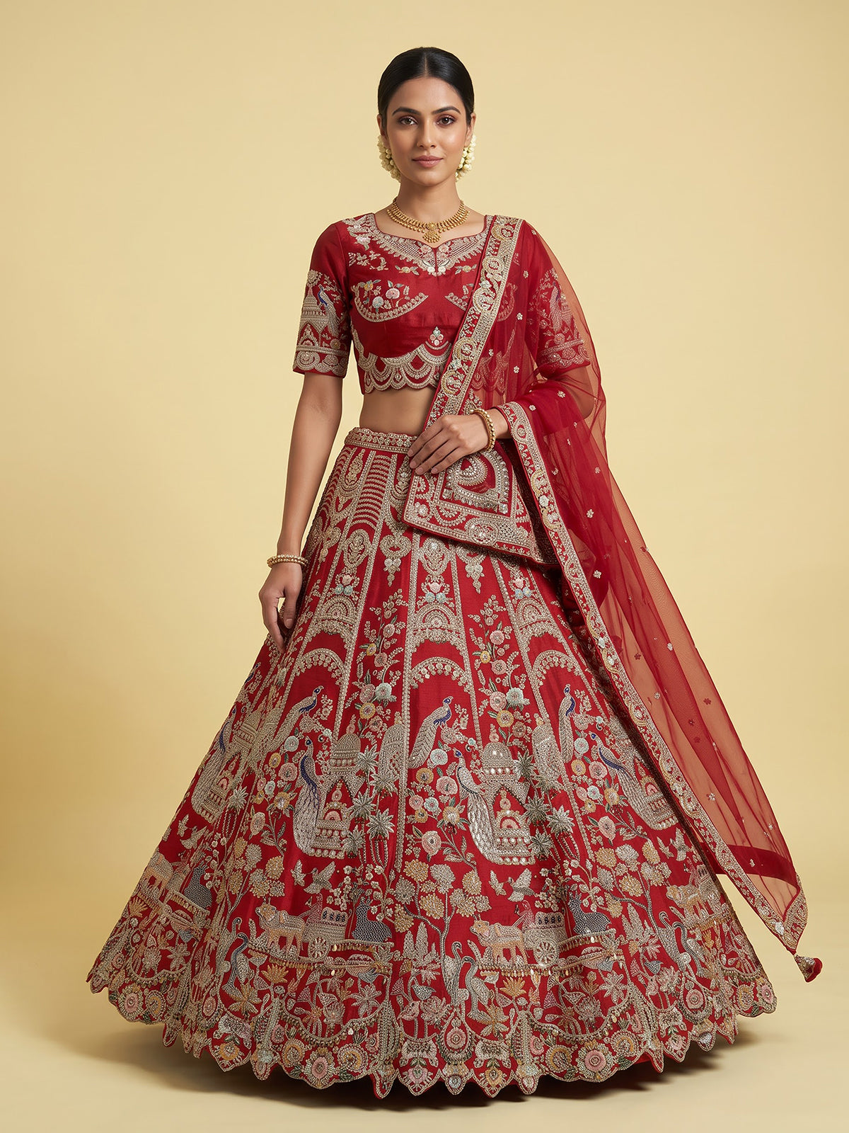 Red raw silk unstitched bridal lehenga choli with artistic detailing