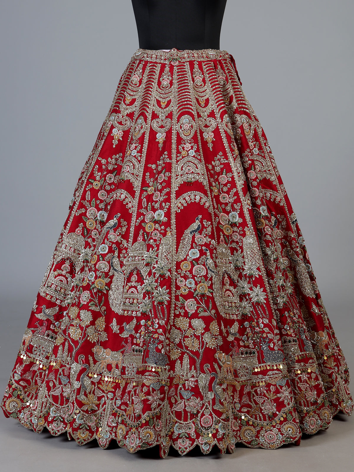 Red raw silk unstitched bridal lehenga choli with artistic detailing