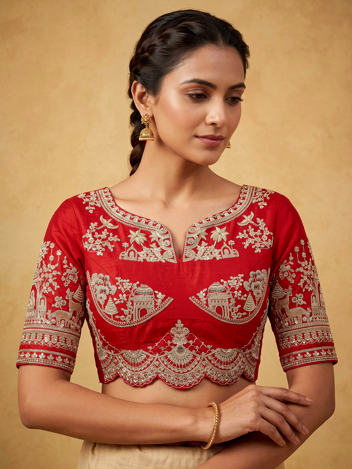 Red raw silk unstitched bridal lehenga choli with ornate craftsmanship