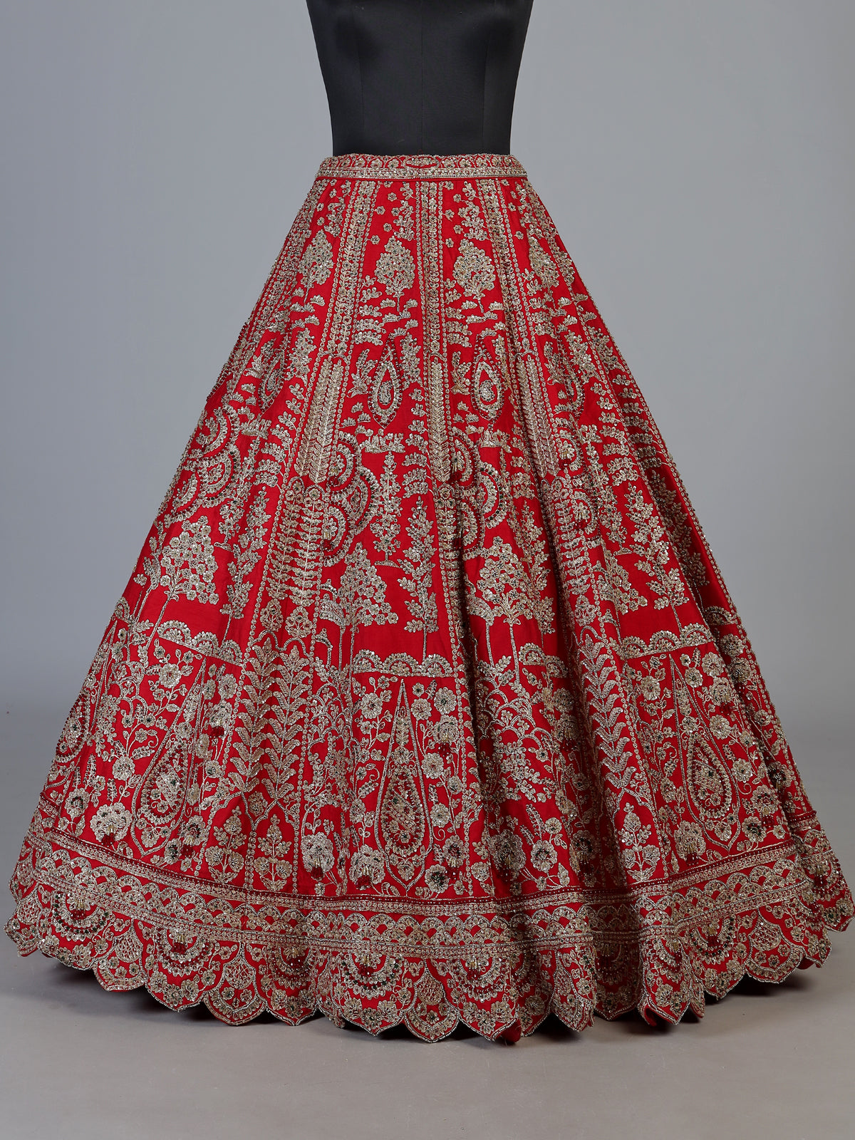 Red raw silk unstitched bridal lehenga choli with lavish detailing