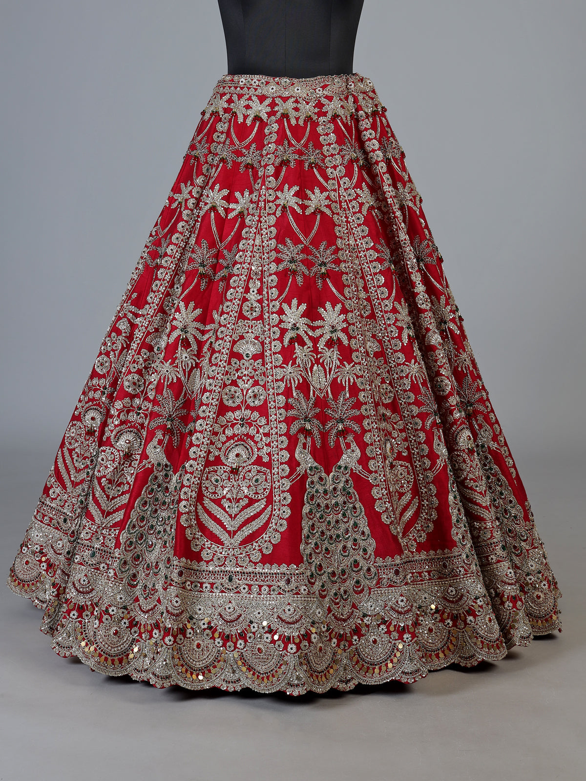Red raw silk unstitched bridal lehenga choli with peacock artistry