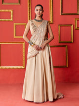 Beige silk designer lehenga choli with tassel accents dupatta