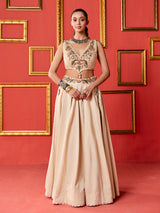 Beige silk designer lehenga choli with tassel accents dupatta