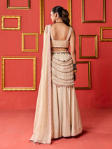 Beige silk designer lehenga choli with tassel accents dupatta