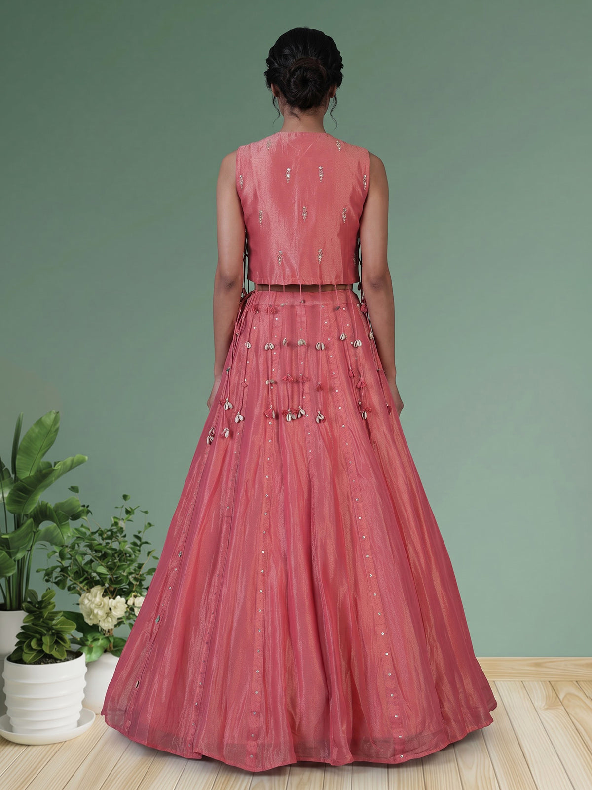 Pink tissue silk lehenga choli with exquisite traditional embellishments