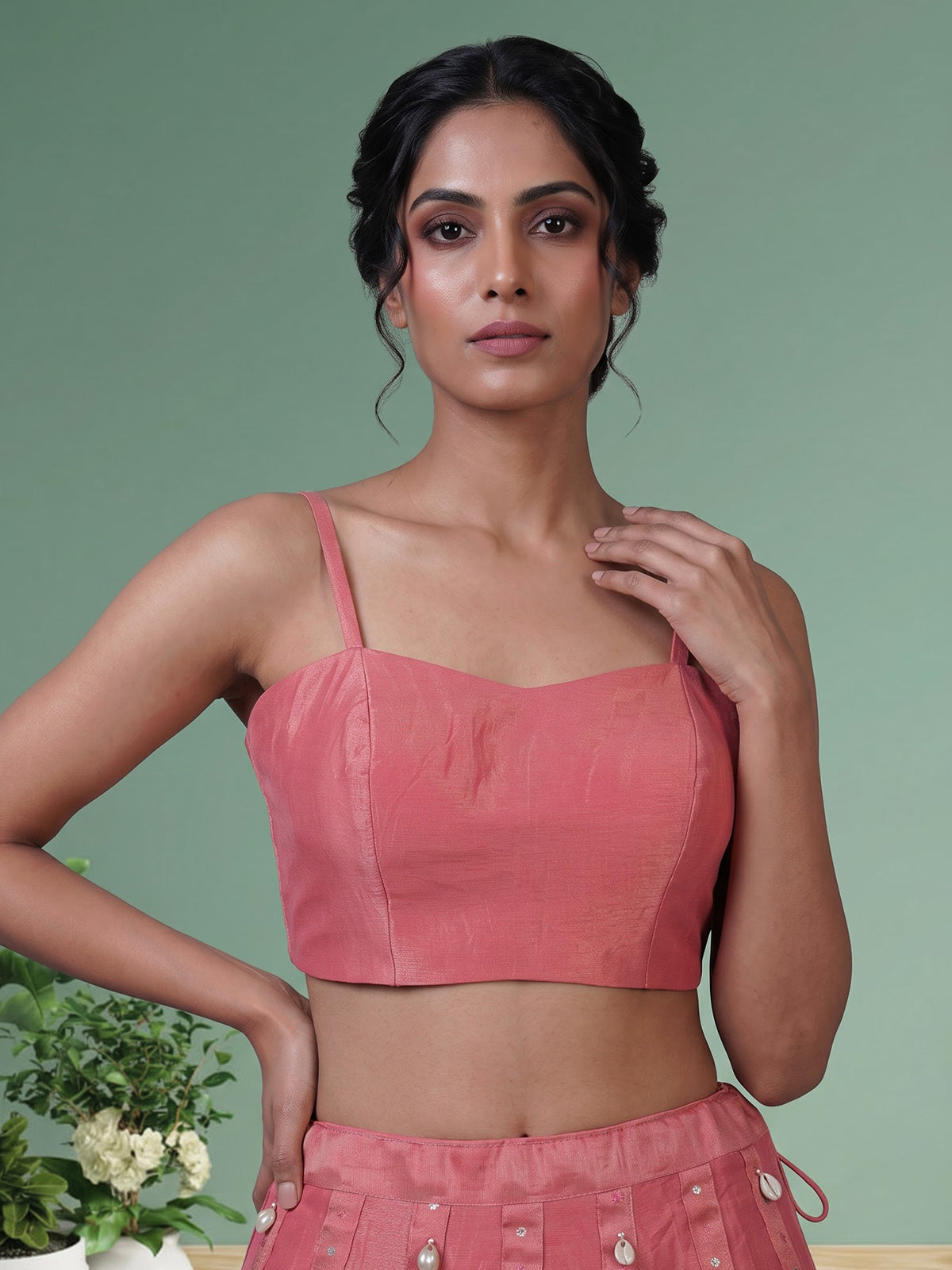Pink tissue silk lehenga choli with exquisite traditional embellishments