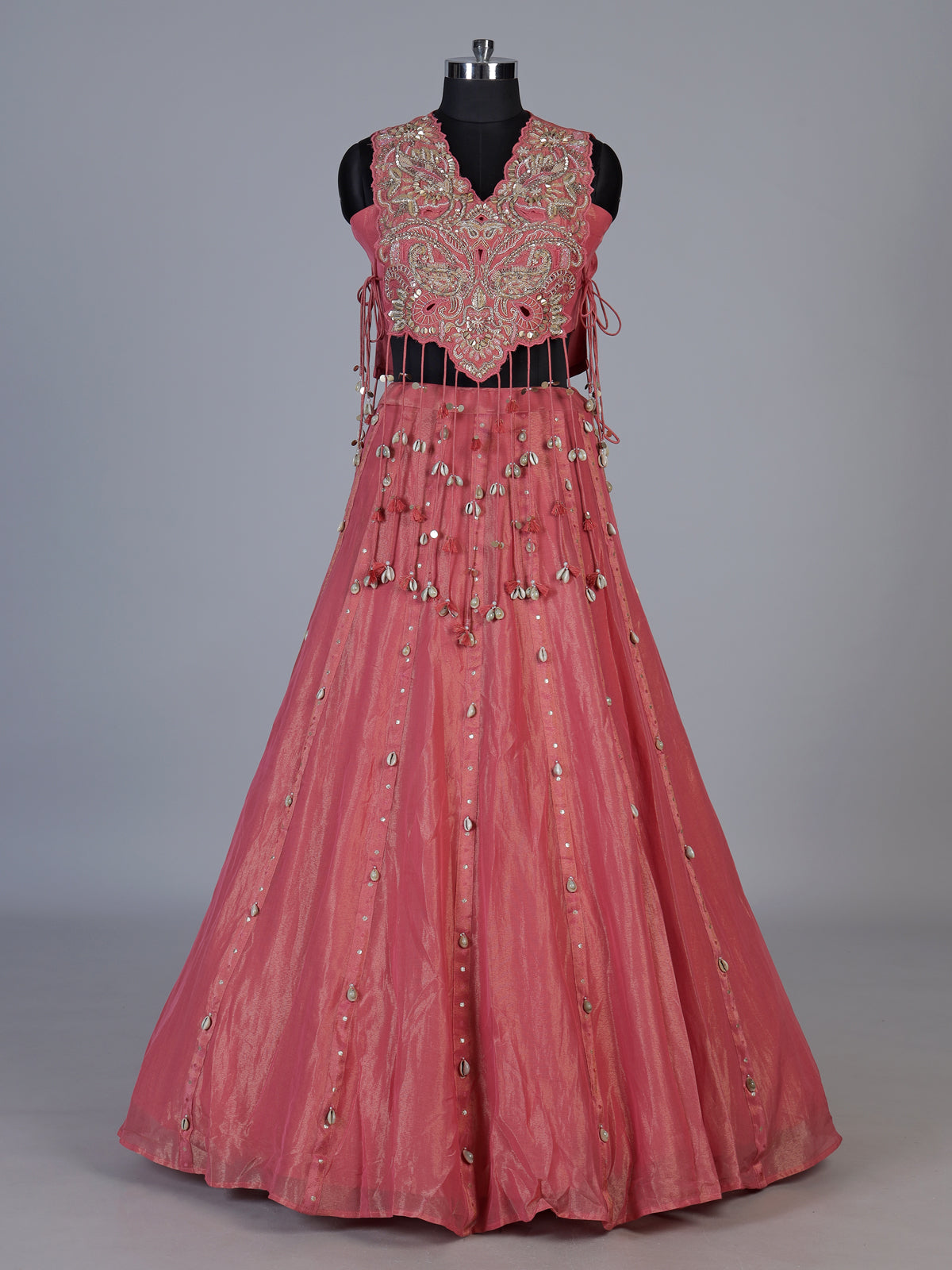 Pink tissue silk lehenga choli with exquisite traditional embellishments