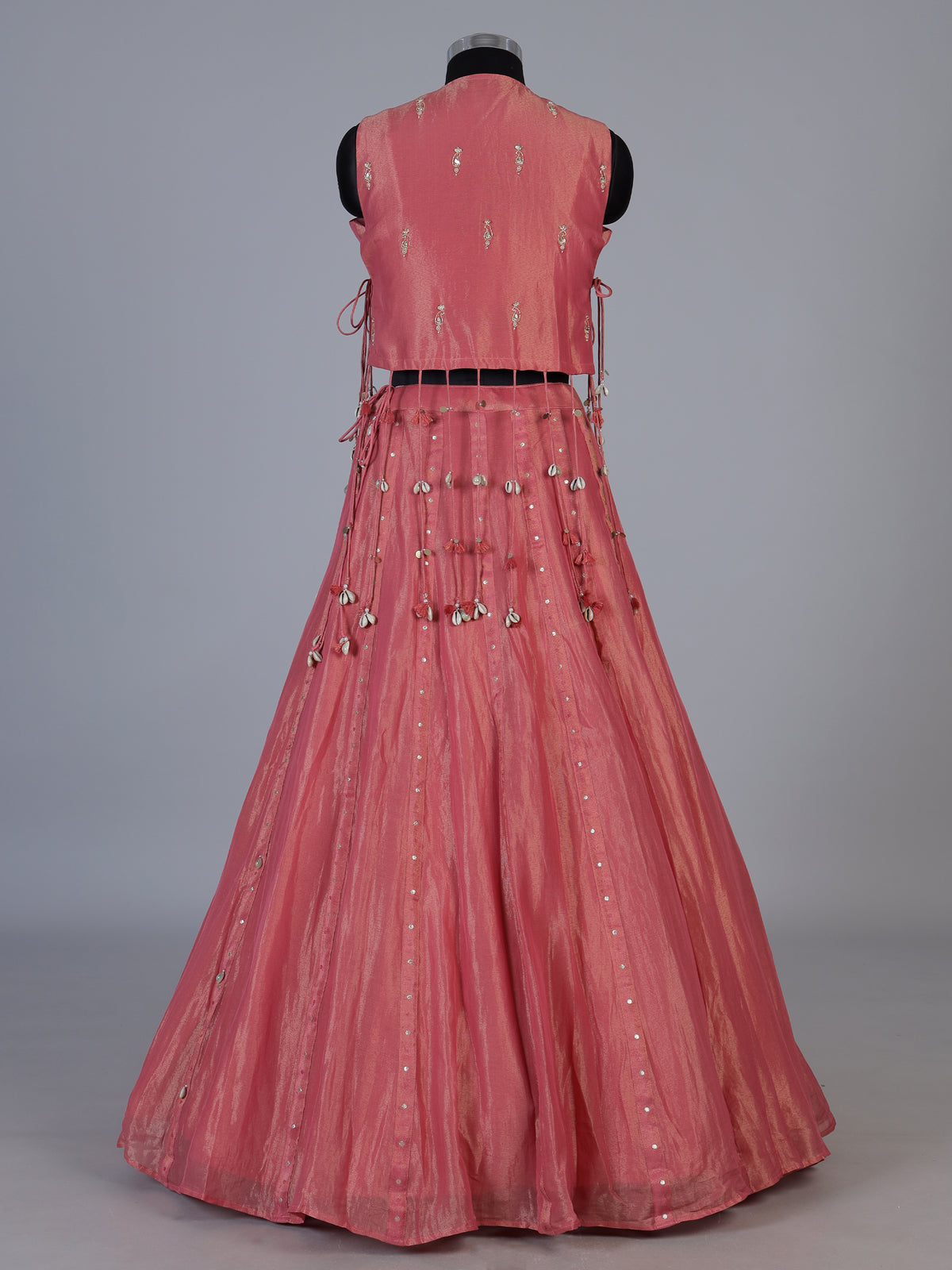 Pink tissue silk lehenga choli with exquisite traditional embellishments