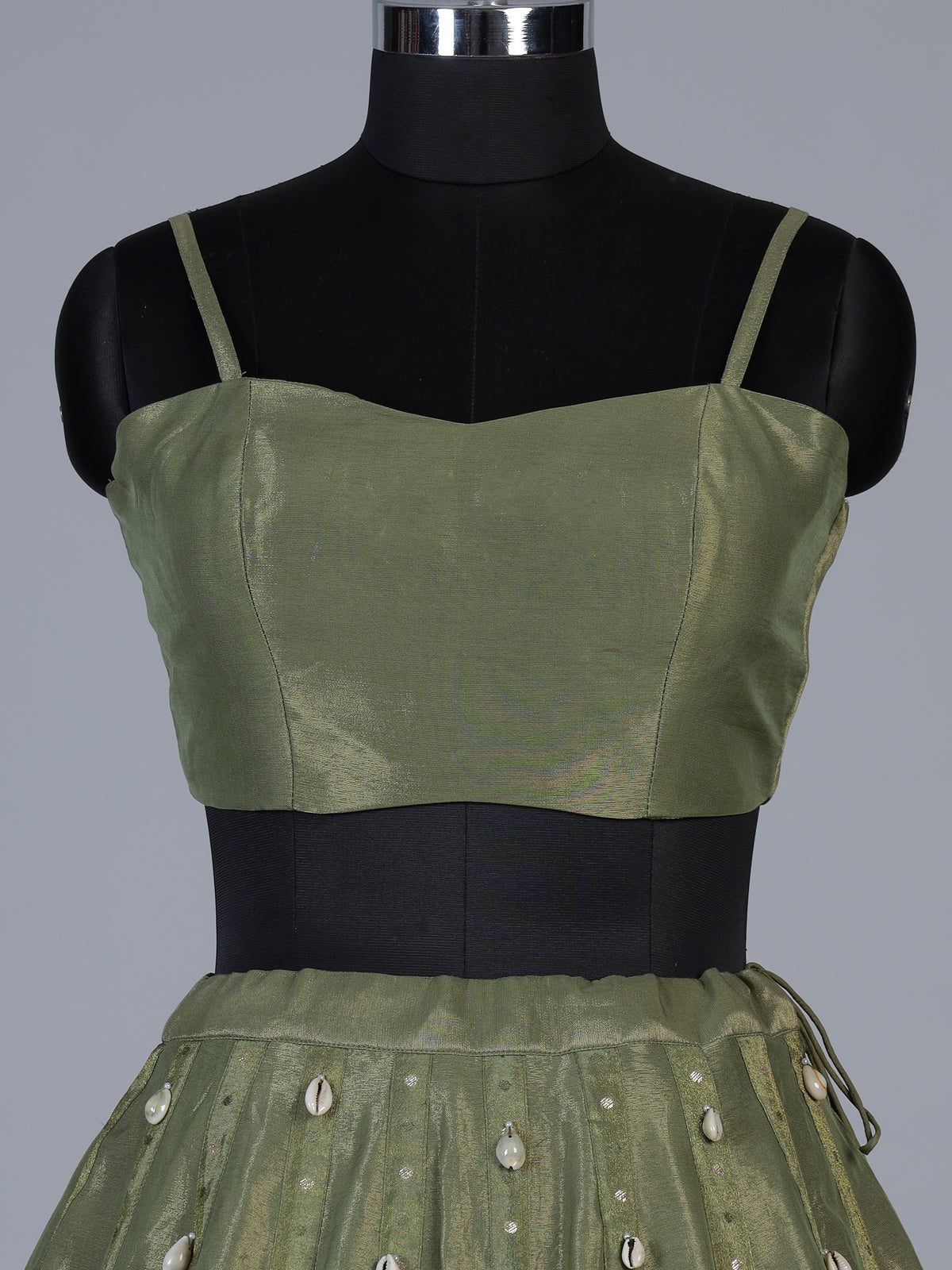 Mehendi green tissue silk lehenga choli with ornate zari craftsmanship