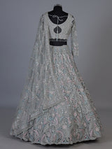 Ice blue net lehenga choli with shimmering diamond embellishments