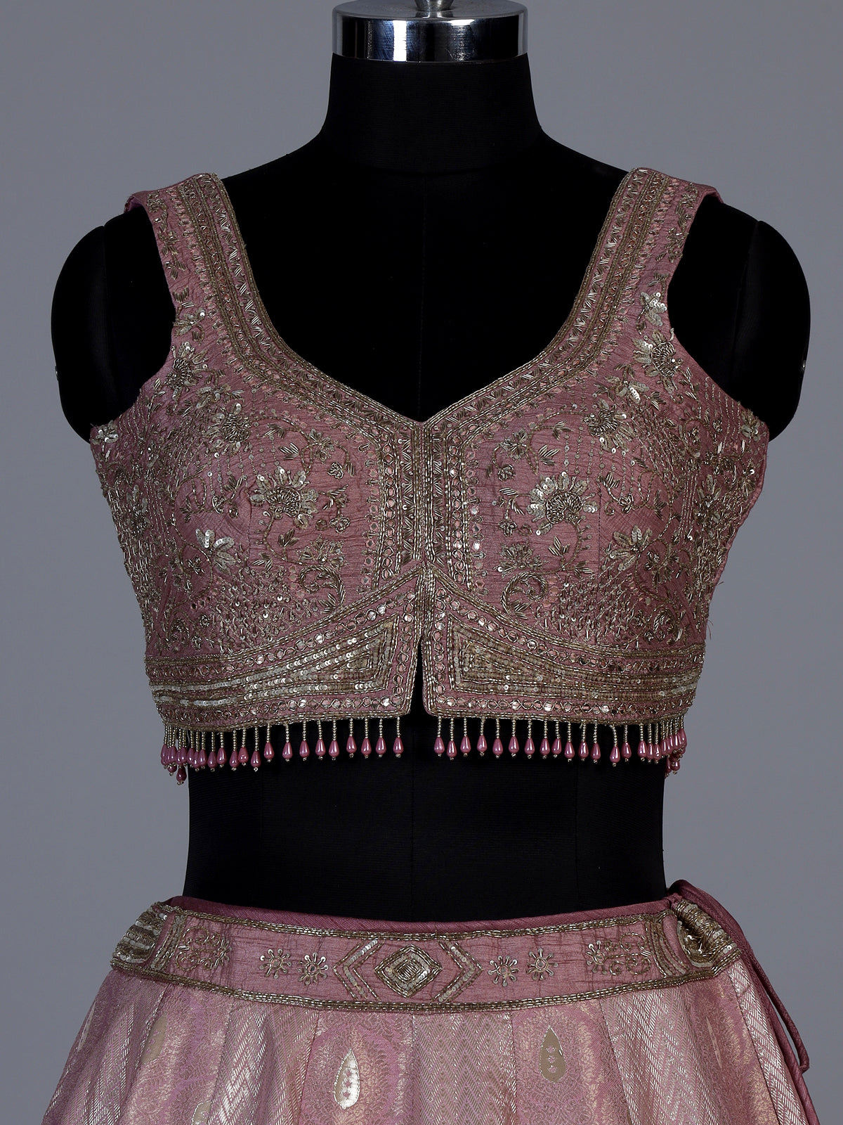 Onion pink jacquard brocade lehenga choli with intricate embellishments