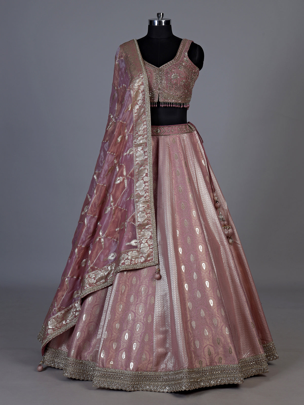 Onion pink jacquard brocade lehenga choli with intricate embellishments