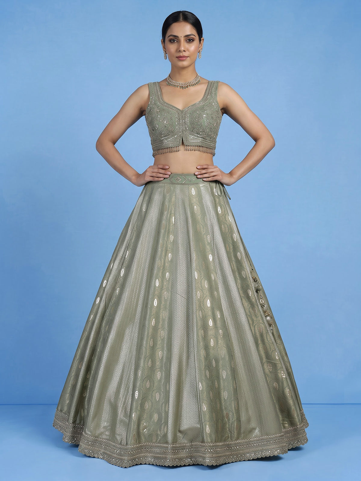 Pista green jacquard brocade lehenga choli with ornate detailing
