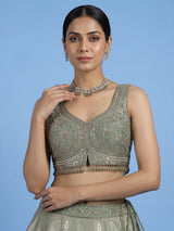 Pista green jacquard brocade lehenga choli with ornate detailing
