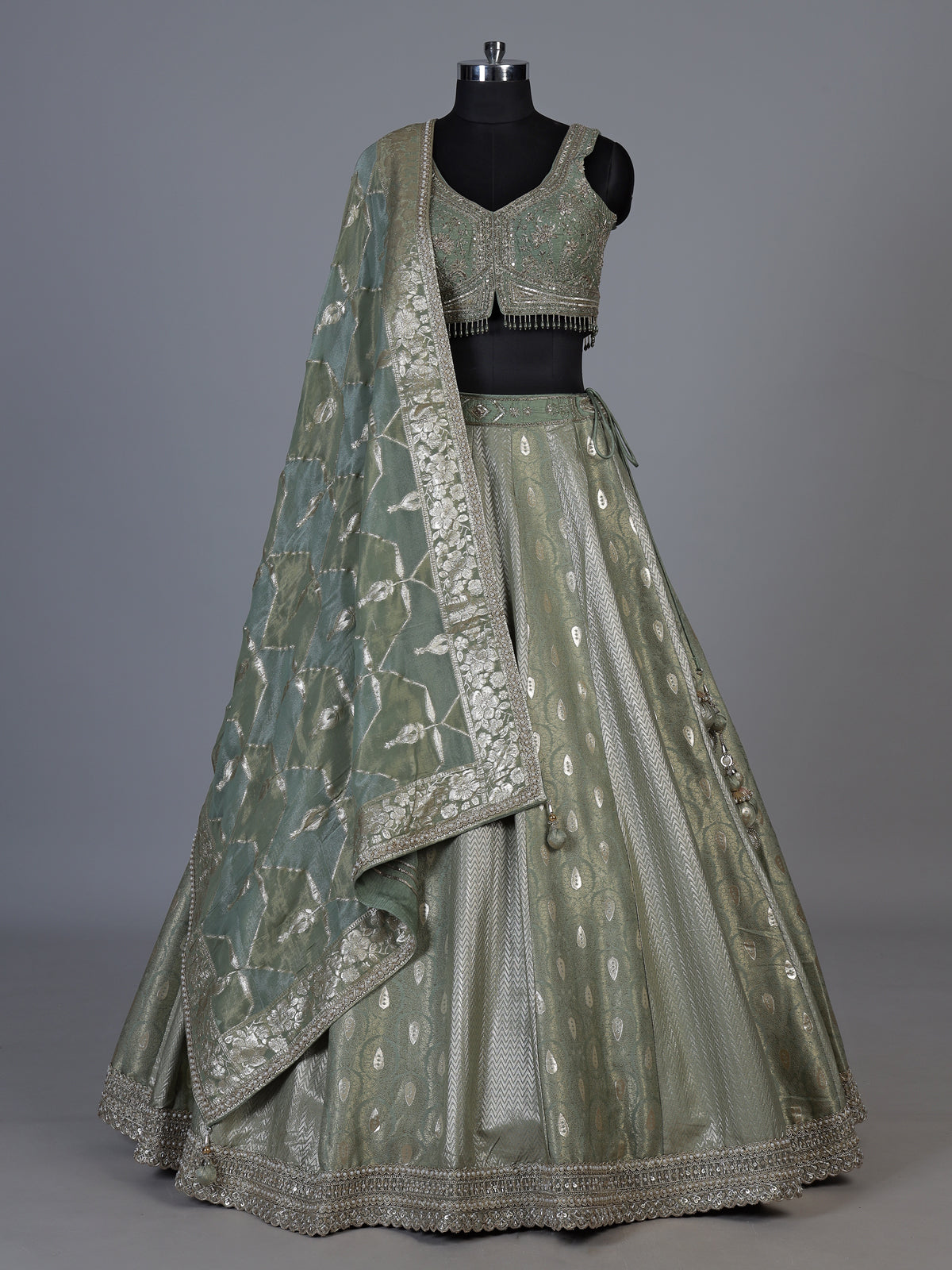 Pista green jacquard brocade lehenga choli with ornate detailing